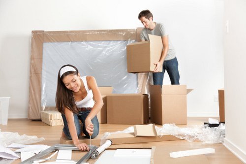 House removal team helping a family move in Rayners Lane