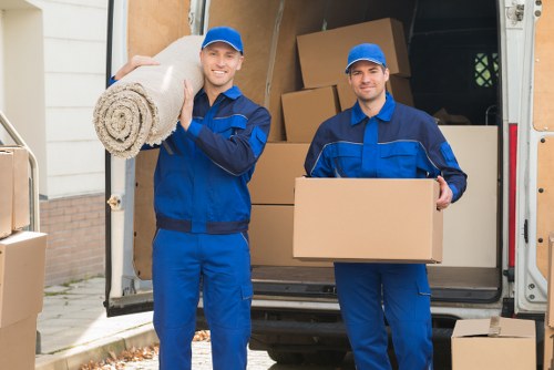 Removal van positioned for loading on a residential street