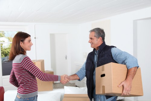 Packed boxes and household items ready for a Rayners Lane move