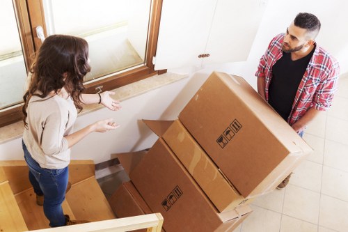 Movers handling commercial equipment during a relocation in Rayners Lane