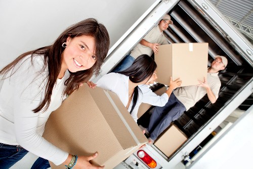 Office removal equipment and desks being loaded for a business move in Rayners Lane