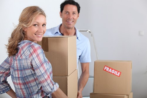Loading household furniture into a van for a Rayners Lane removal